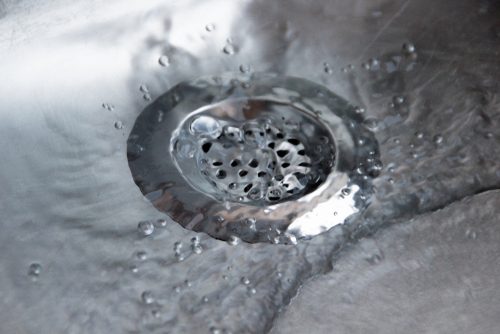 Close,Up,Of,A,Metallic,Silver,Drain,Strainer,In,A